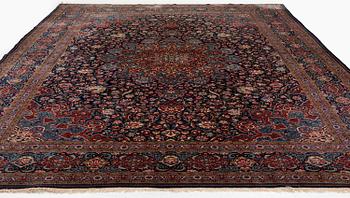 A semi-antique Kashan 'Dabir' carpet, central Persia (Iran), c. 437 x 299 cm.
