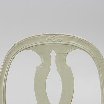 Ten similar Gustavian chairs, Sweden, around the year 1800.