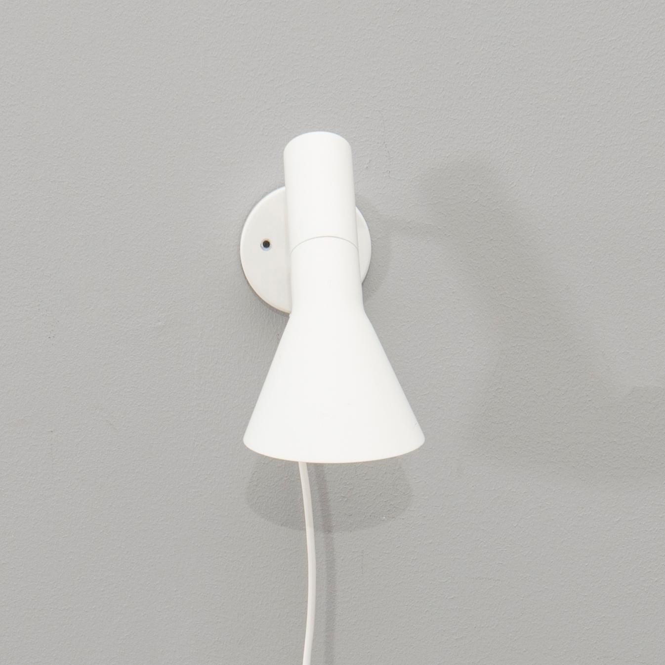 Arne Jacobsen, wall lamp "AJ" for Louis Poulsen 21st century.