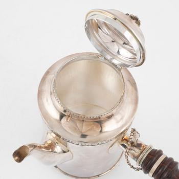 Eric Löfman, a silver coffee pot and creamer, mark of MGAB, Uppsala 1979.