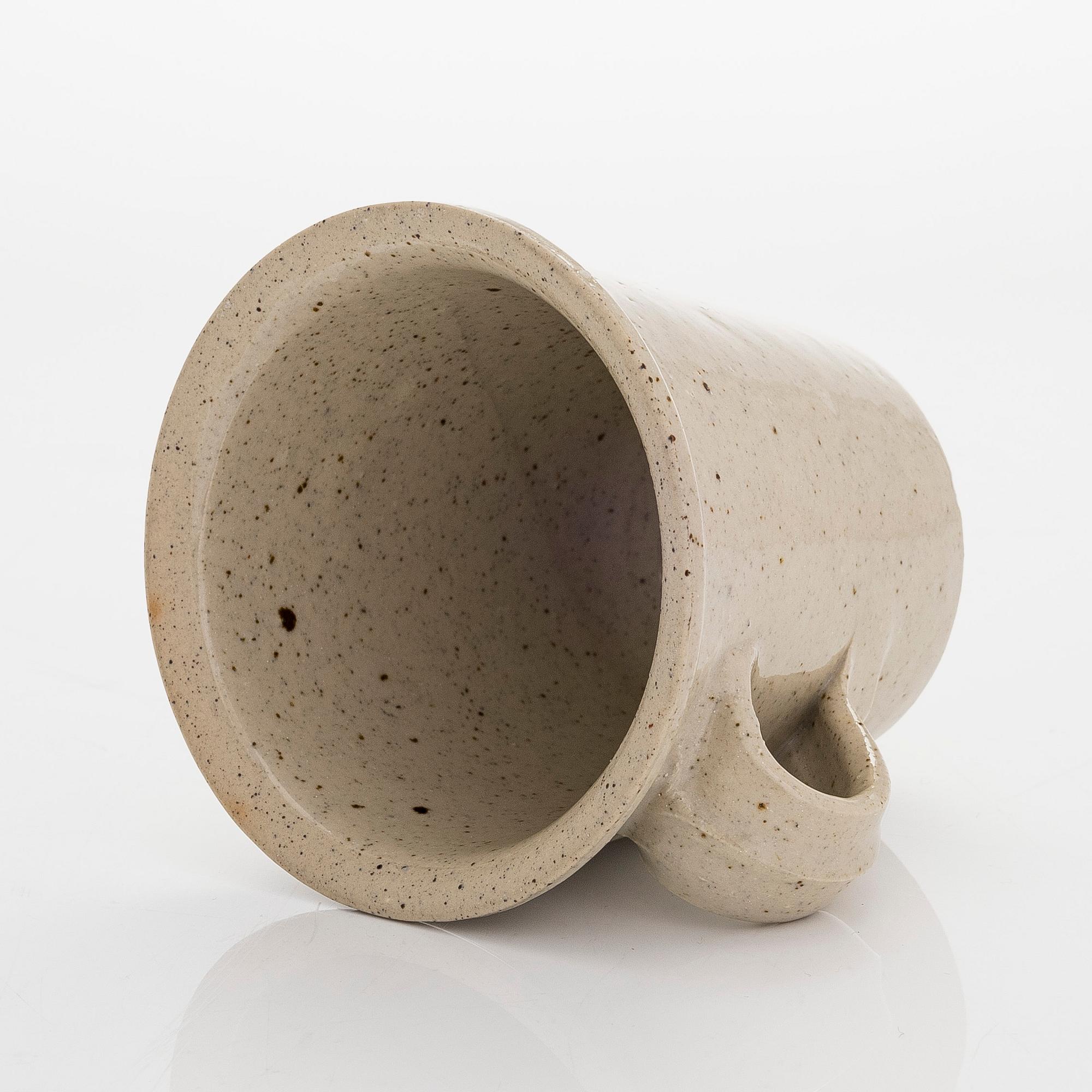 Kyllikki Salmenhaara, a stoneware tea strainer signed KS.