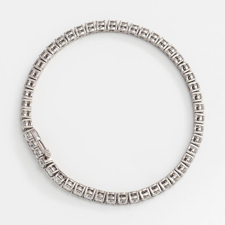 Tennis bracelet, brilliant cut diamonds, 18K white gold.