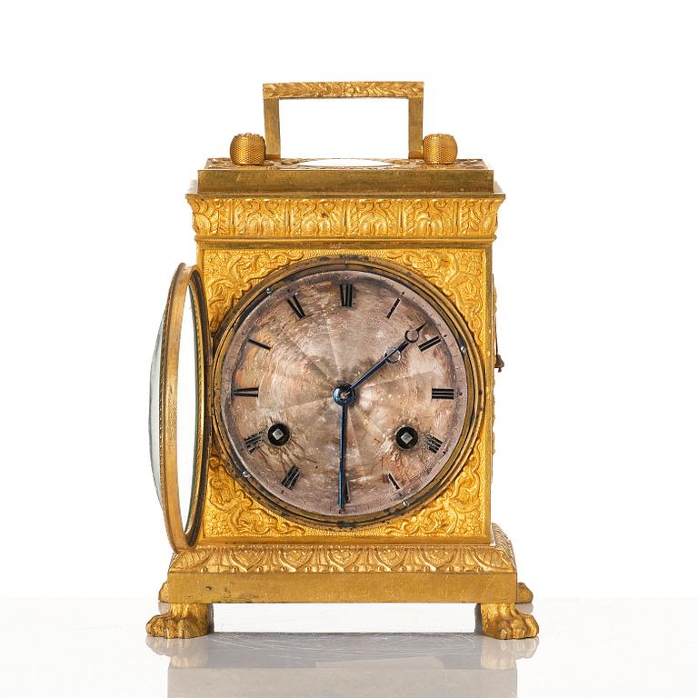 A late empire mantel clock, mid 19th century.