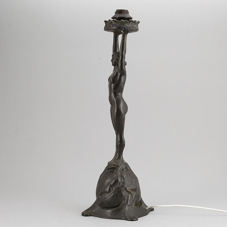 GERDA SPRINCHORN, an Art Nouveau green patinated bronze lamp "The Sun", Herman Bergman, Stockholm, early 20th century.