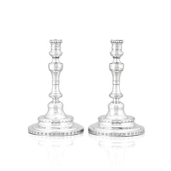 A pair of Swedish Rococo silver candlesticks, mark of Pehr Zethelius, Stockholm 1775.