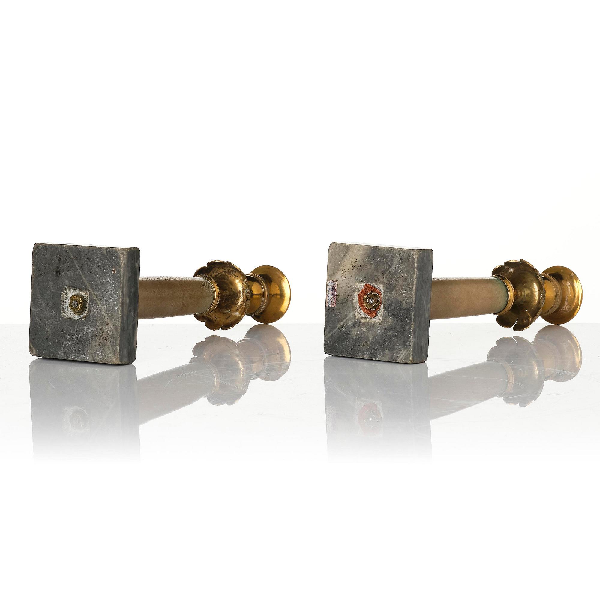 A pair of late Gustavian gilt brass and marble candlesticks, Stockholm, late 18th century.
