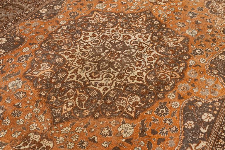 An antique Tabriz carpet, Northwest Persia, 453 x 310 cm.