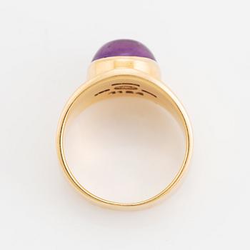 Georg Jensen, Poul Hansen, 18K gold and cabochon cut amethyst ring.