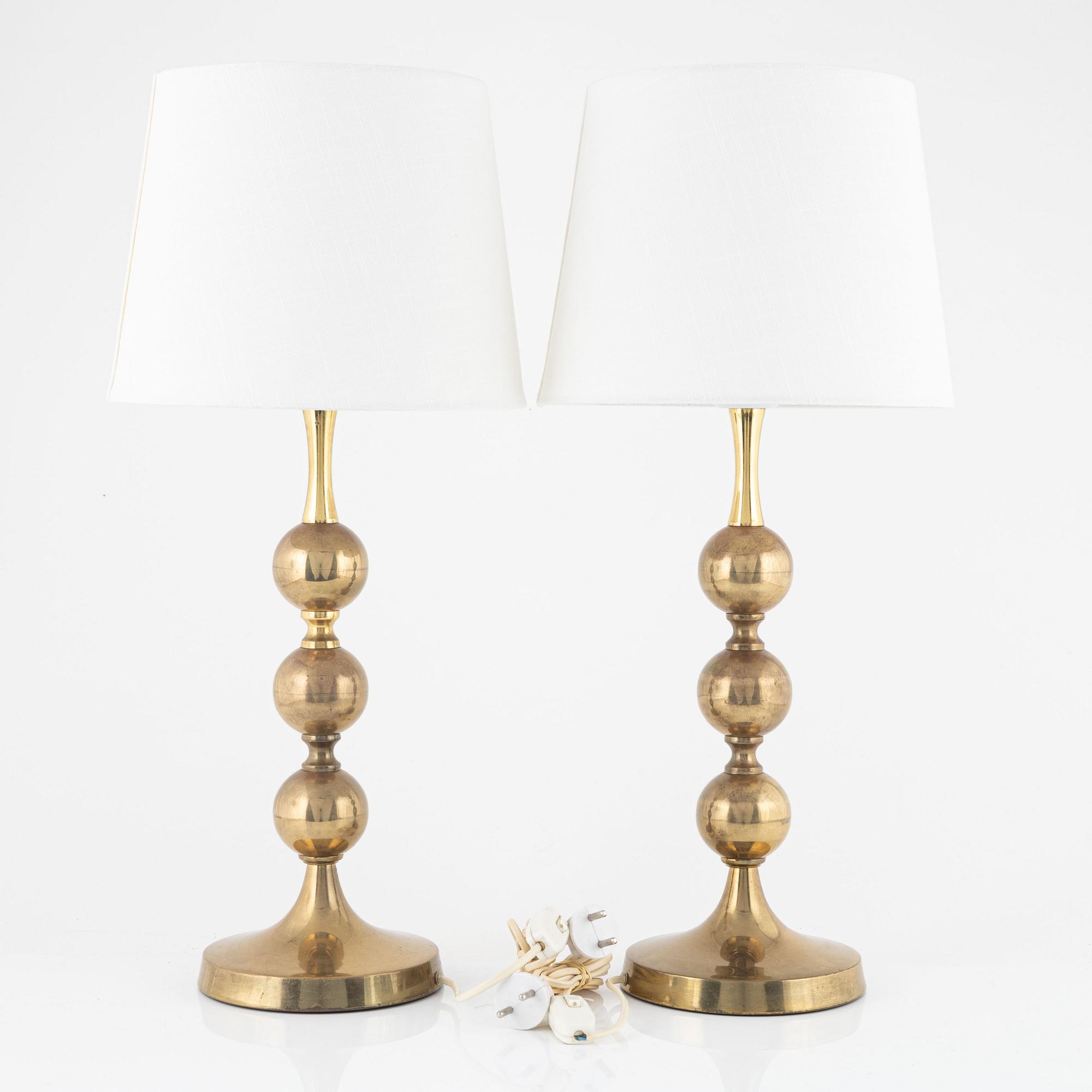 A pair of table lamps, yellow metal, second half of the 20th century.