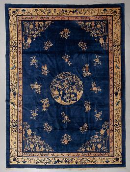 A carpet, a semi-antique/old China, ca 329-333,5 x 239,5-243,5 cm.