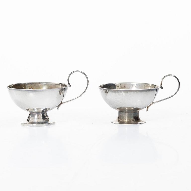 Punchmuggar, 7 st, silver, bl a Cesons, Göteborg 1985.