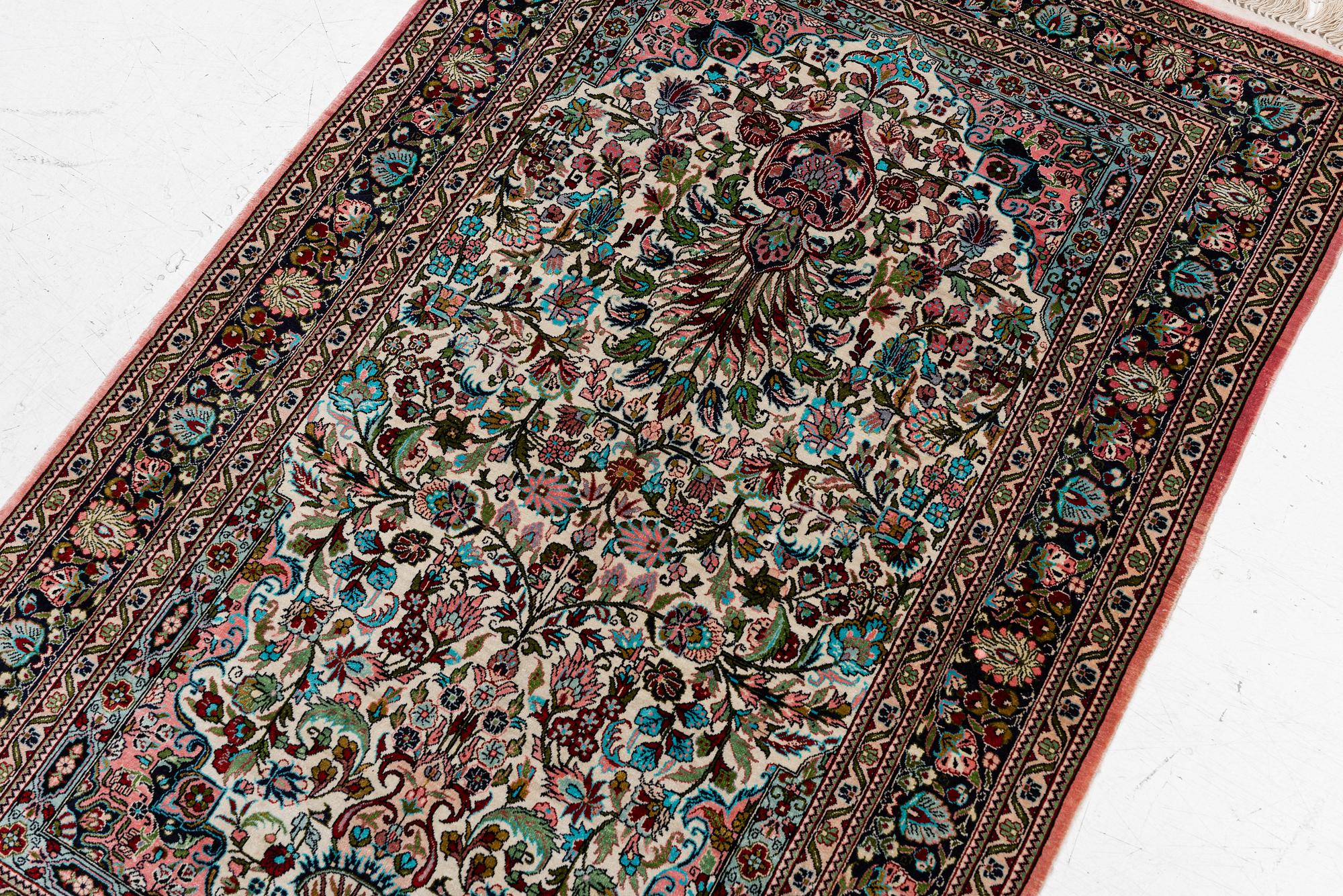 Rug, Hereke design, silk, 122 x 79 cm.