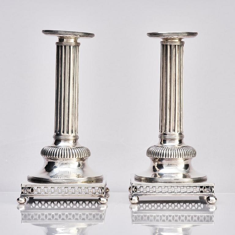 A pair of Swedish 18th century Gustavian silver candlesticks, marks of Arvid Floberg, Stockholm 1799.