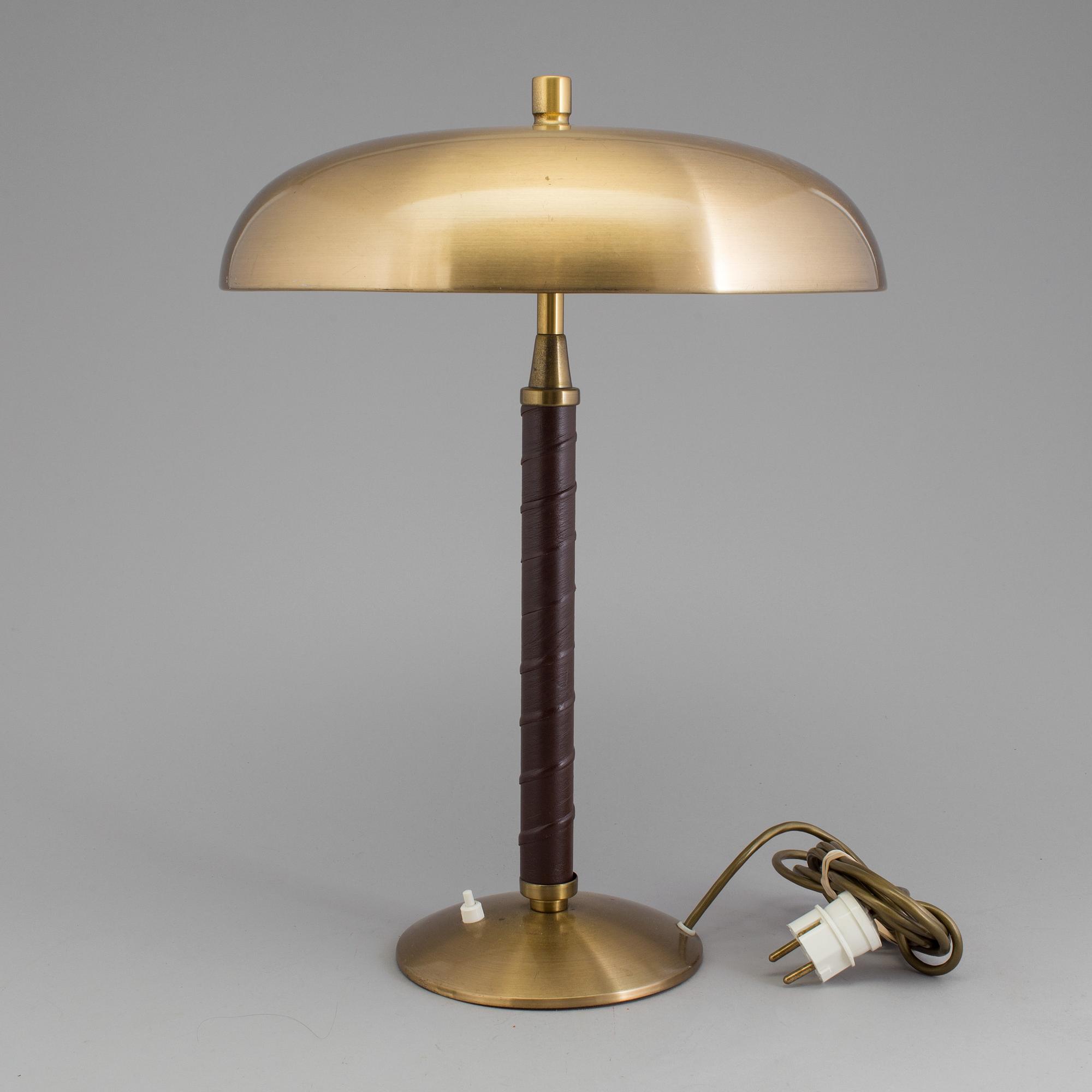 A Swedish 20th century brushed brass table lamp by Einar Bäckström, Malmö.