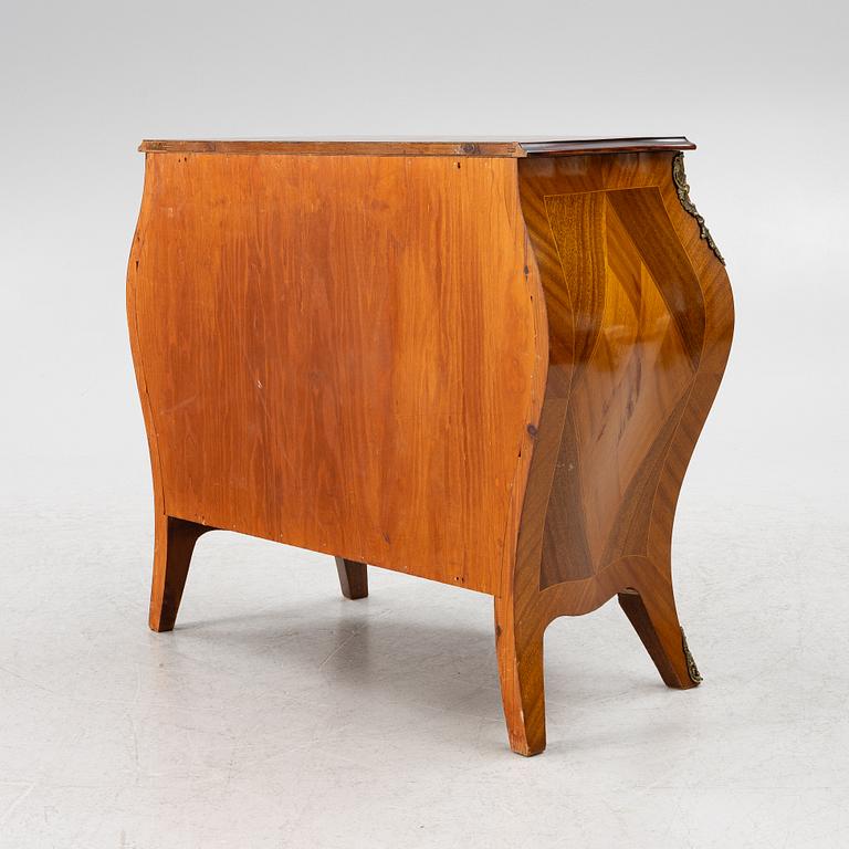 A Rococo style chest of drawers, mid-20th century.