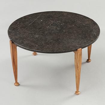 A Josef Frank black marble top table, walnut based, Svenskt Tenn, model 960.