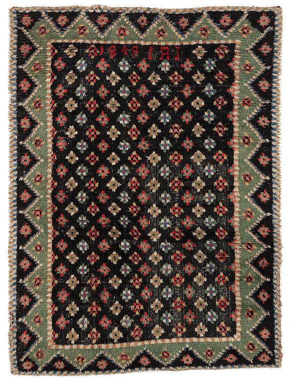 A Knotted pile (rya), c. 200 x 140 cm, Finland, dated 1849.