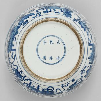 A blue and white punch bowl, Qing dynasty (1644-1912), with Qianlong mark.