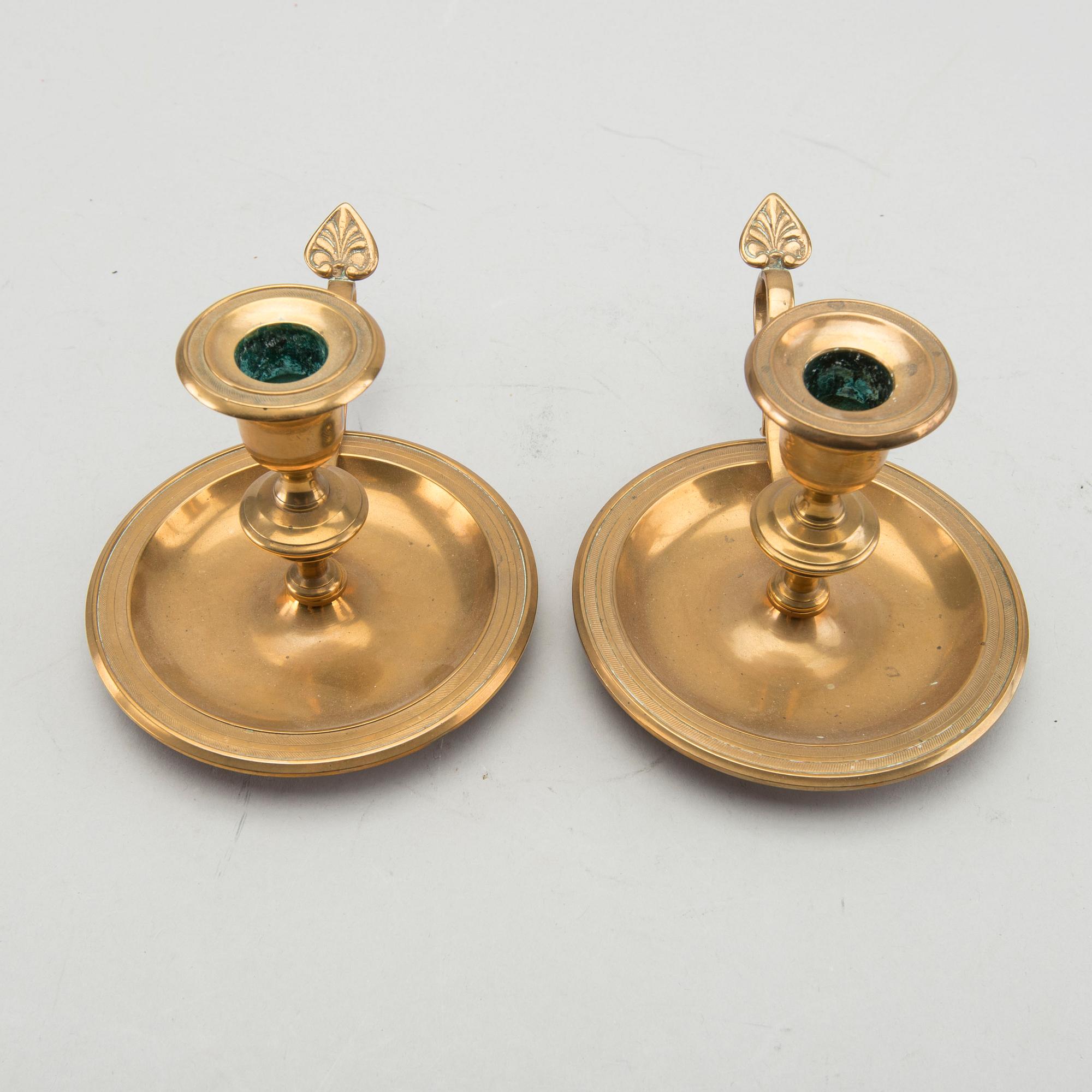 A pair of Gusum brass candelsticks.