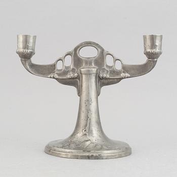 A Kayserzinn pewter vase and candelabrum, German, early 20th Century.