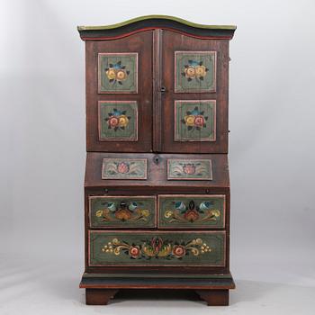 A painted 19th Century folk art bed cabinet.