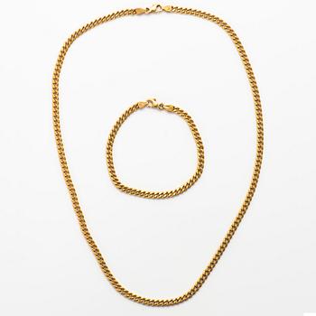 A set of 14K gold necklace and bracelet.