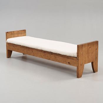 A stained pine daybed possibly by Axel Einar Hjorth, Nordiska Kompaniet, Sweden ca 1930.