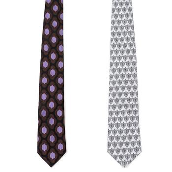 626. A set of two 1990s silk ties by Gucci.
