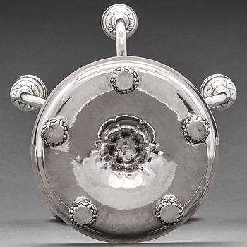 Georg Jensen, a pair of 830/1000 silver five light candelabra, Copenhagen 1920, design nr 200.