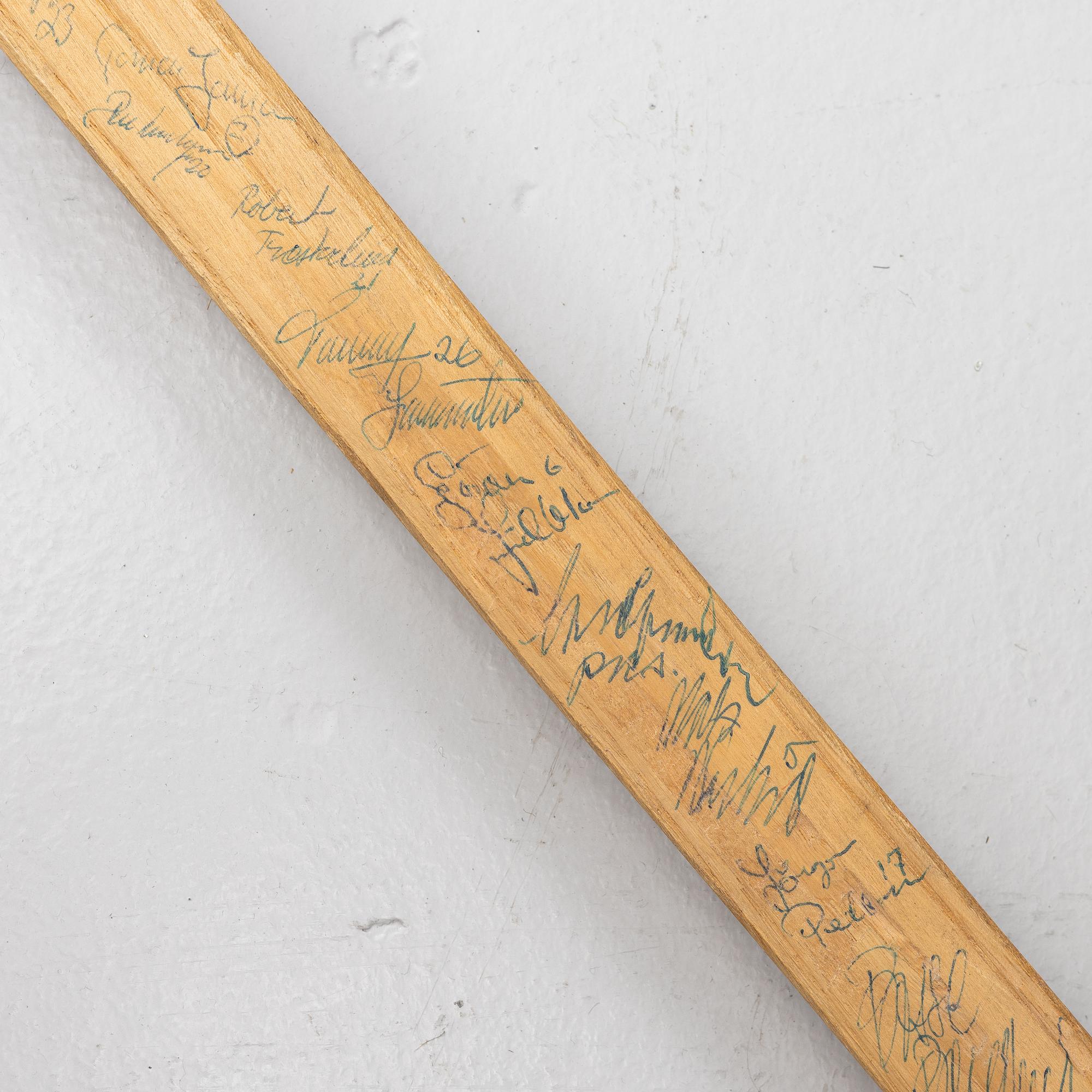 Pelle Lindberg's goaltender stick with autographs.