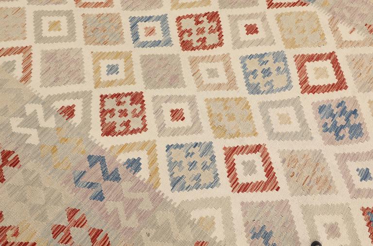 A Kilim rug, approx. 300 x 196 cm.