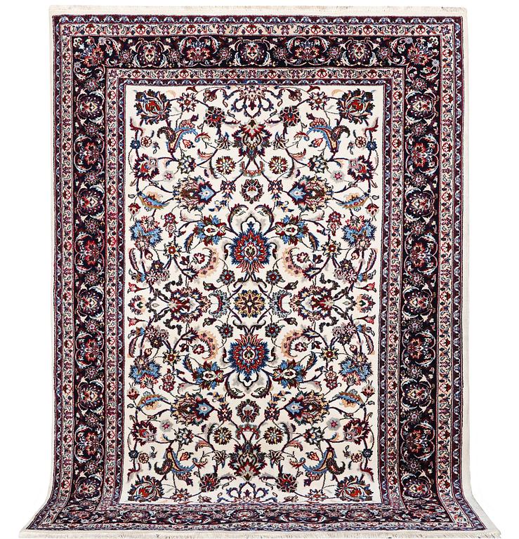 A Nain carpet, part silk, c. 294 x 201 cm.