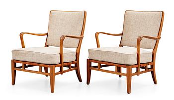 A pair of Carl-Axel Acking easy chairs by NK circa 1946.