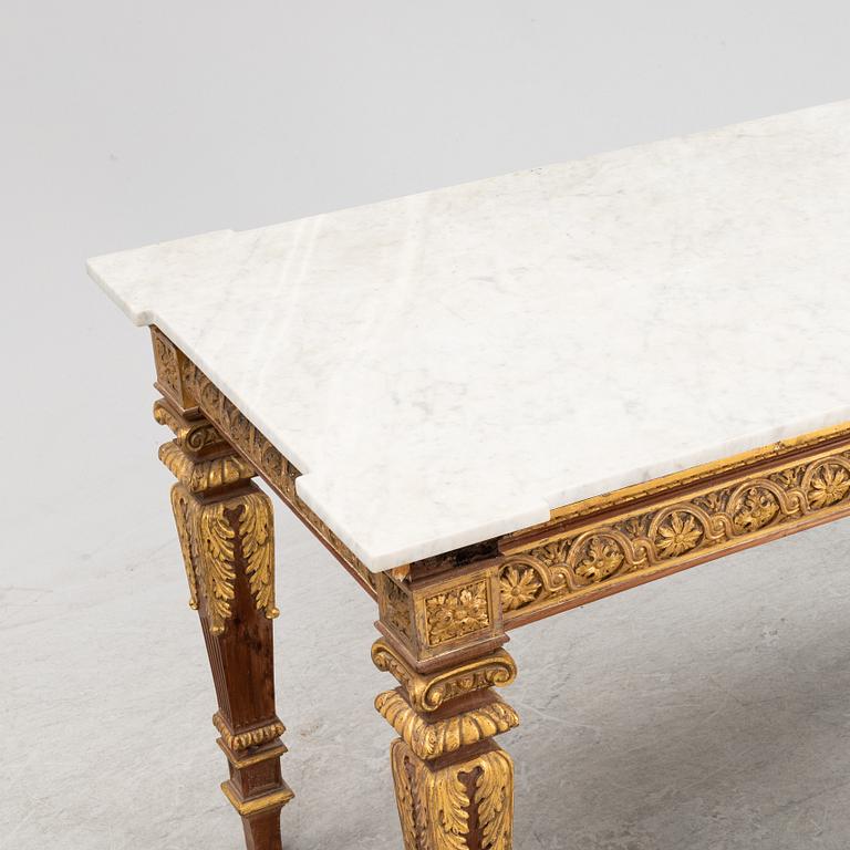 A Louis XVI-style table, France, 19th Century.