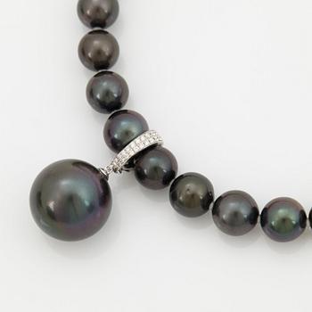 A cultured Tahitian and South Sea pearl necklace with a detachable cultured Tahitian pearl pendant.