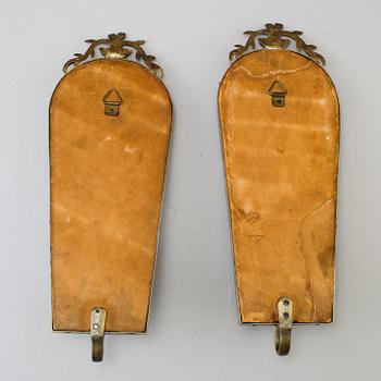 a pair of wall sconces ny Firma Svenskt Tenn in 1928.