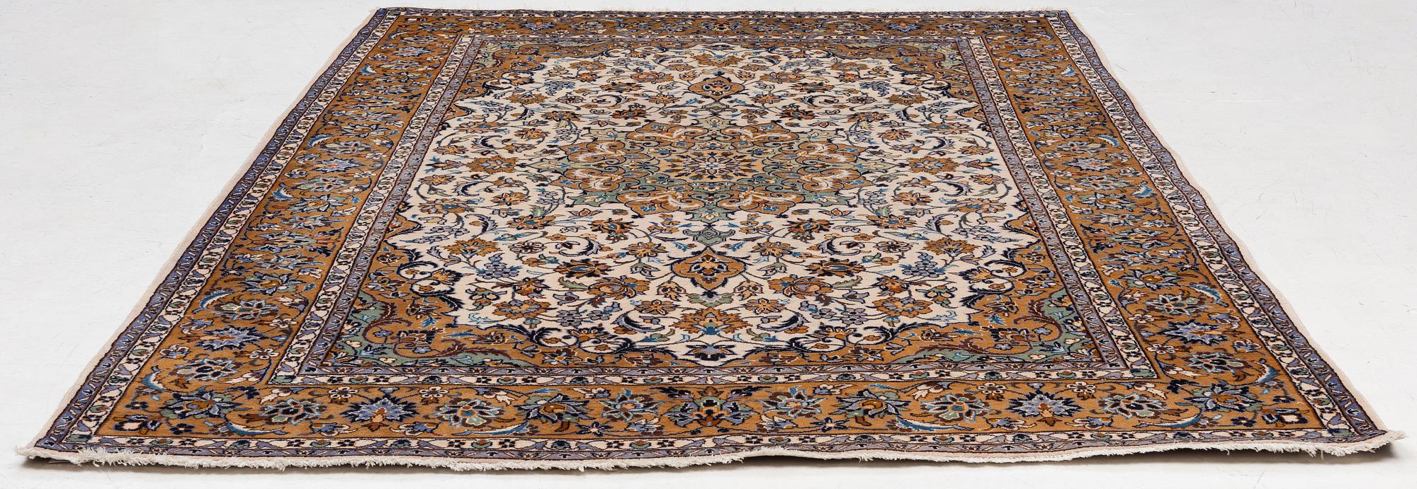 A Najafabad carpet, c. 350 x 237 cm.
