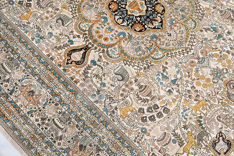 A pictoral orientalisk rug, ca 246 x 156 cm.