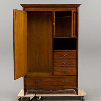 an early 20th century mahogany cabinet/wardrobe.