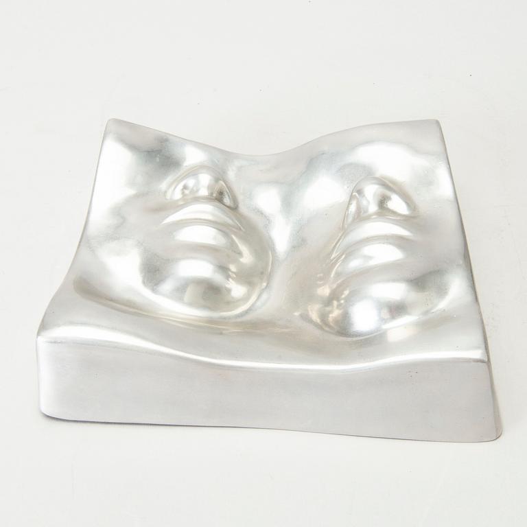 An Barbro Bäckström relief in aluminium. Signed and dated 60/75 1972.