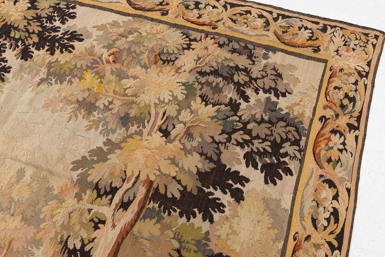 A European 'verdur' tapestry, c. 297 x 290 cm, 17th century.