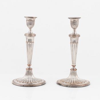 A pair of silver plated candelabra/candlesticks, England, first half of the 20th Century.