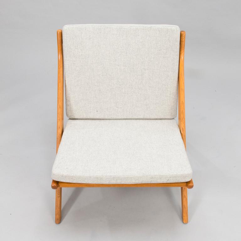 FOLKE OHLSSON. A 1960's lounge chair "SCISSORS" for Bodafors.