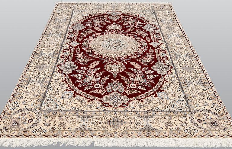 A carpet, Figural Nain, Part silk, S.K 6LAA, 239 x 155 cm.