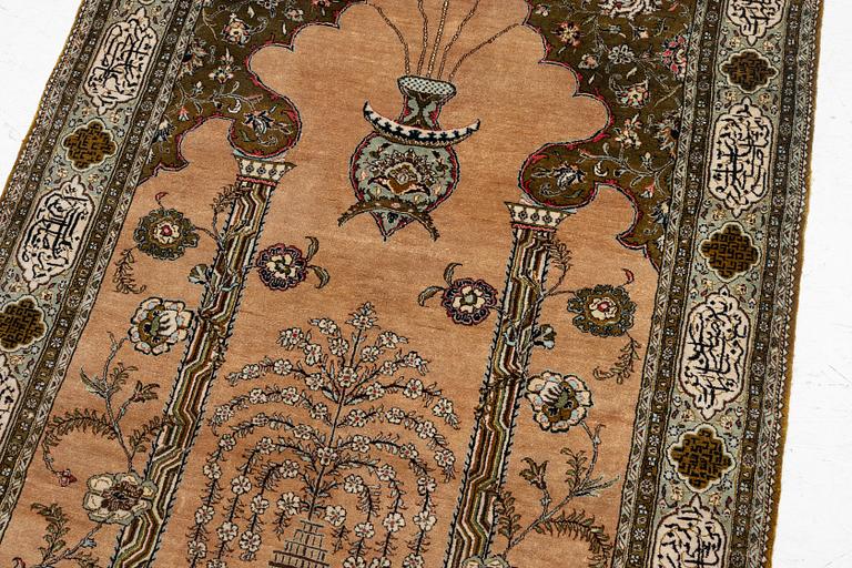 A silk Quum rug, c. 155 x 103 cm.