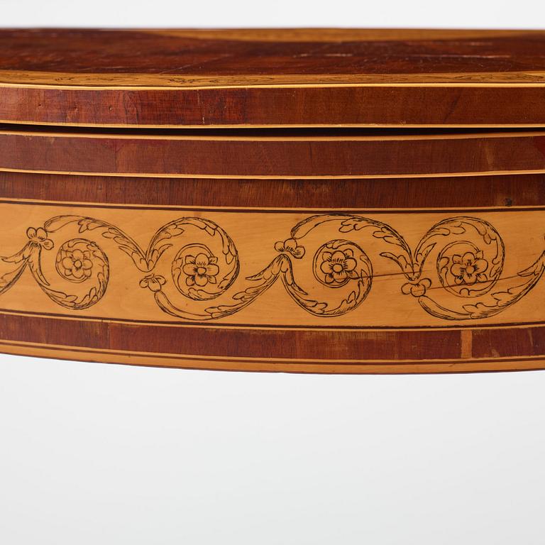 A Russian Louis XVI mahogany and birch parquetry demi-lune games table, late 18th century.