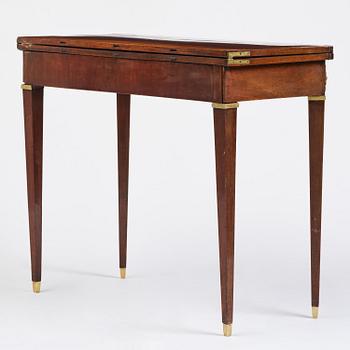 A Gustavian 'concertina action' mahogany games table by Georg Haupt (master in Stockholm 1770-84).