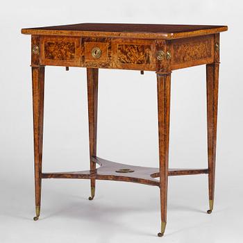 A Gustavian burr-parquetry and bilt brass-mounted table by A. Lundelius (master in Stockholm 1778-1823).
