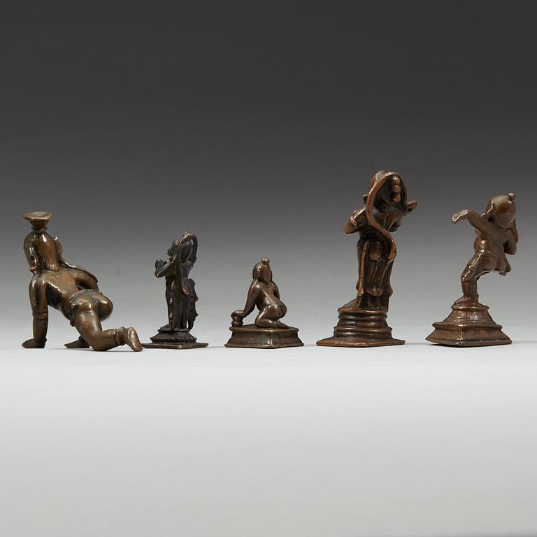 A group of five Indian copper alloy figures of hannuman and krisna, 18th Century and older.