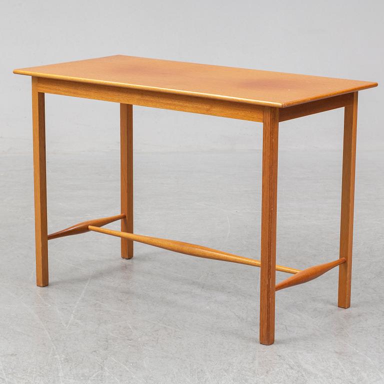 A model 1106 mahogany side table by Josef Frank for Firma Svenskt Tenn.